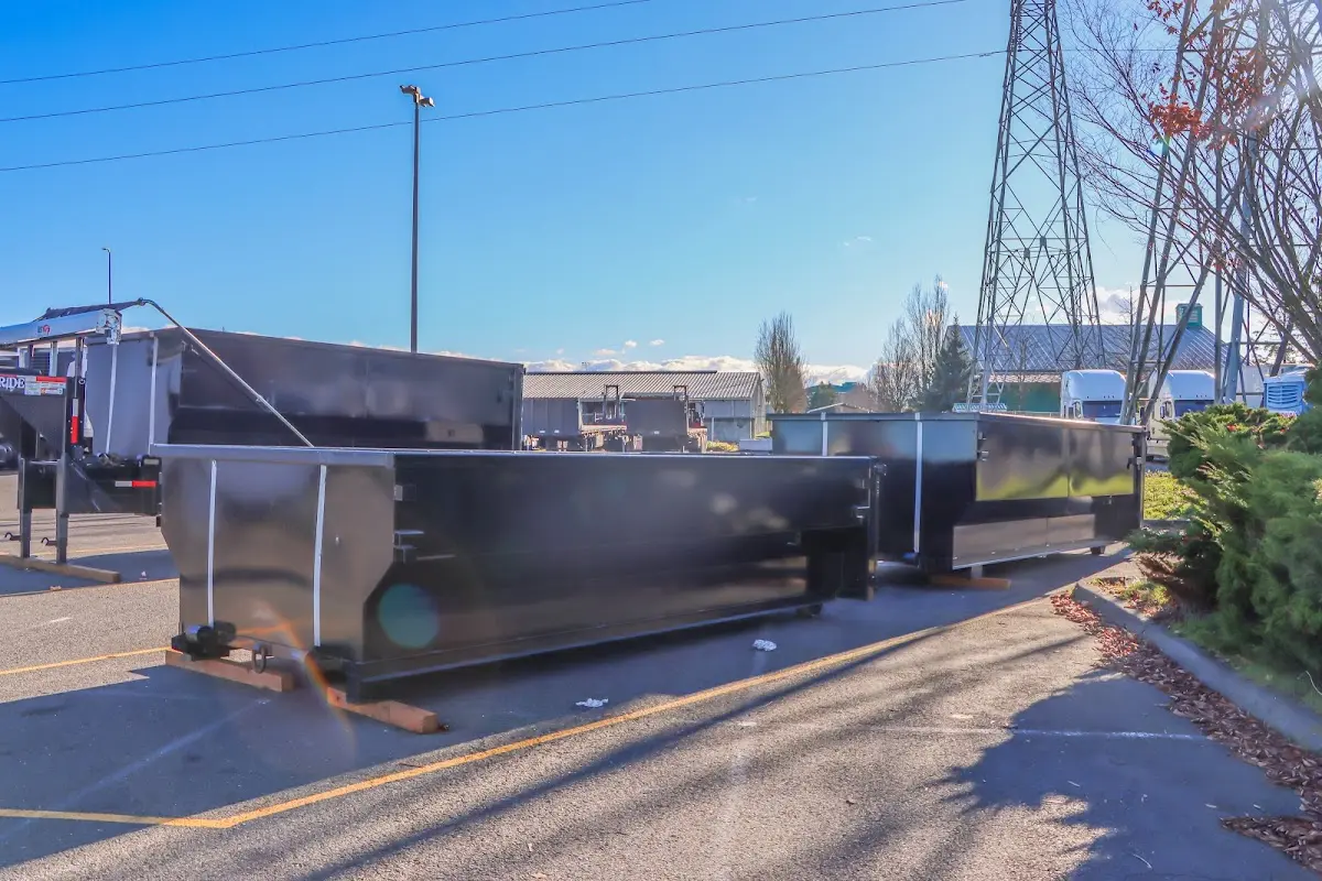 Roll-off dumpster ready for waste disposal at job site for Yard Waste Dumpster Rental in Woodridge